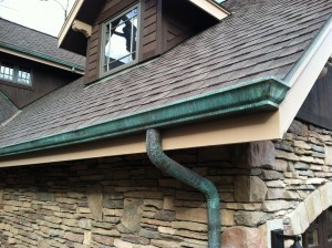 copper gutter with patina